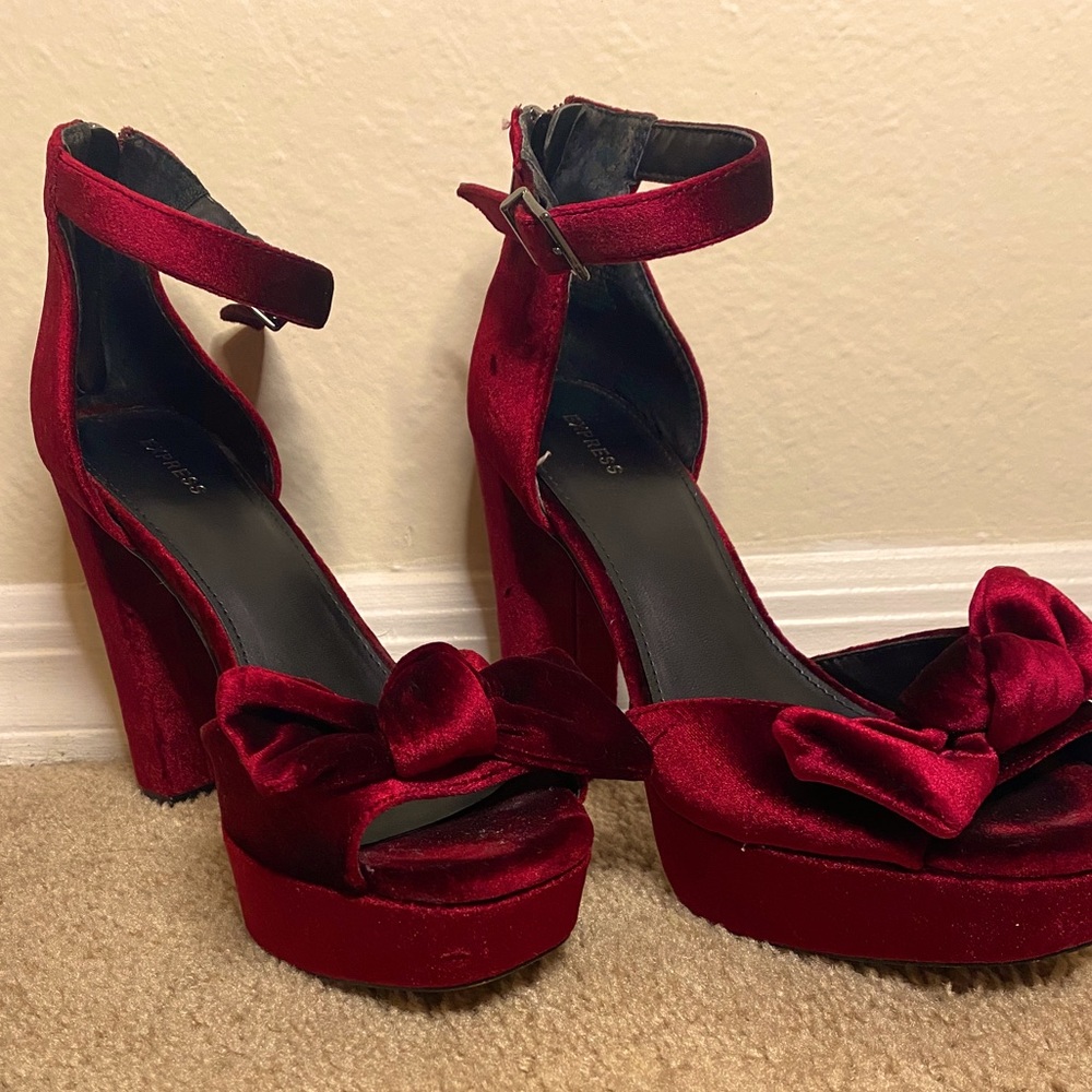 Red velvet platform heels via Express